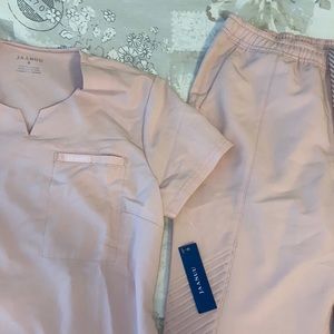 Jaanuu light pink scrubs, tags on